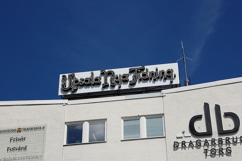 Skylt ovanför Uppsala Ny Tidnings centralkontor.
